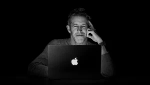 Apple Ignites Nostalgia with Revolutionary MacBook Pro: The Return of the Glowing Logo and a Touch-Enabled Future